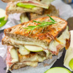 Take your grilled cheese game to the next level with this Prosciutto and Brie Grilled Cheese. Buttery bread, melty cheese and prosciutto combine to create a fantastic toasted sandwich!