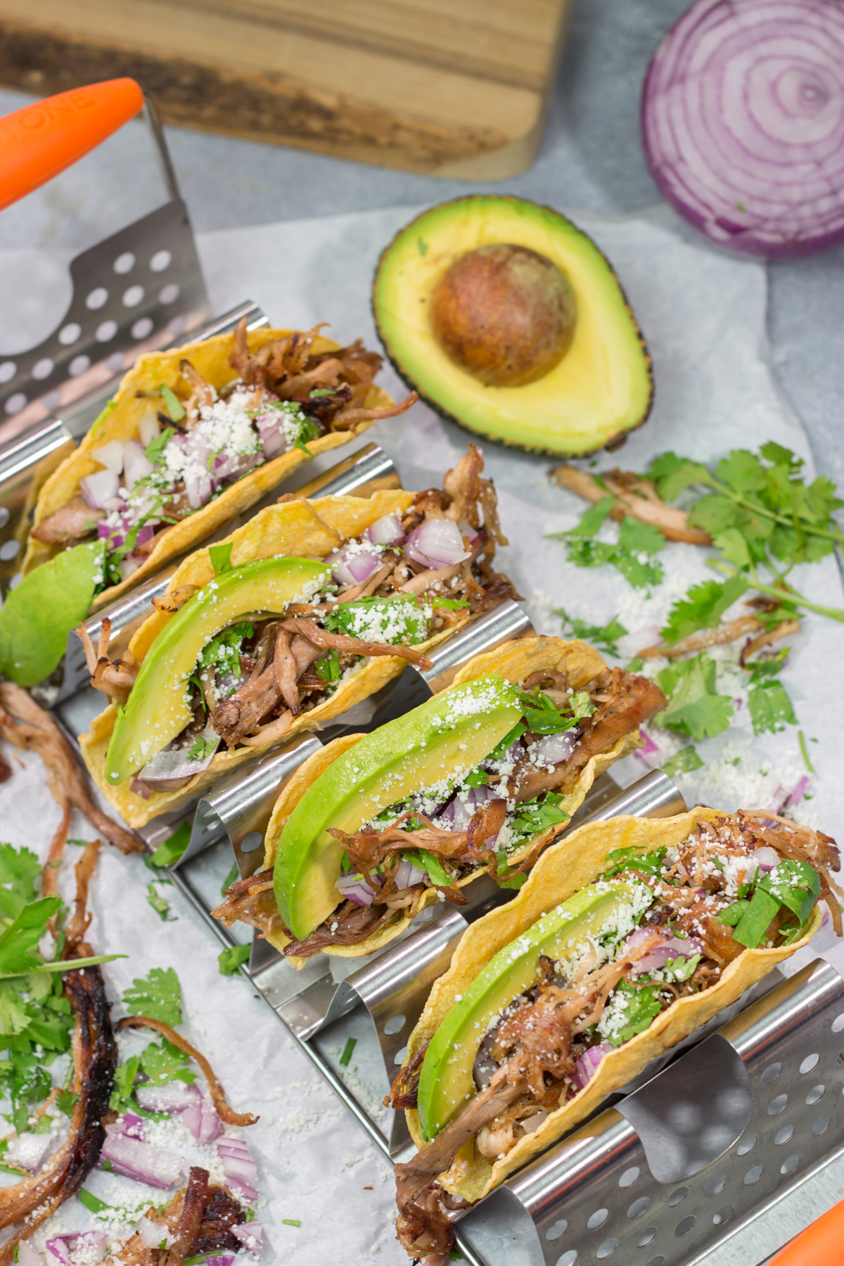 Make it a taco night! These Smoked Pork Tacos feature carnitas-style pork topped with topped with all of your favorite taco toppings. They're perfect for a crowd...or just a Tuesday night!