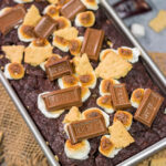 Loaded with chocolate, graham crackers and marshmallows, a slice of this Smores Quick Bread makes for a fantastic snack or dessert!