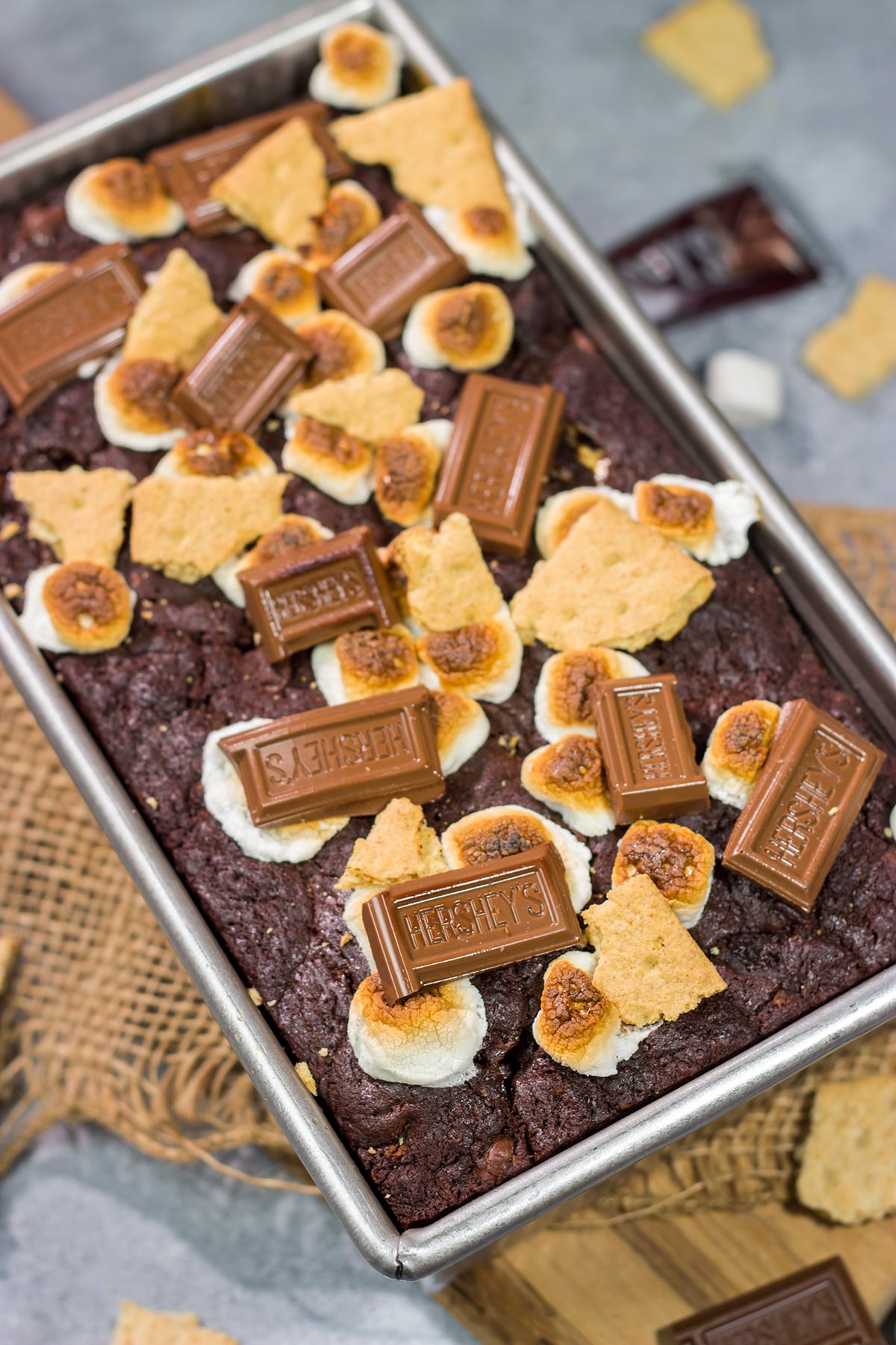 Loaded with chocolate, graham crackers and marshmallows, a slice of this Smores Quick Bread makes for a fantastic snack or dessert!