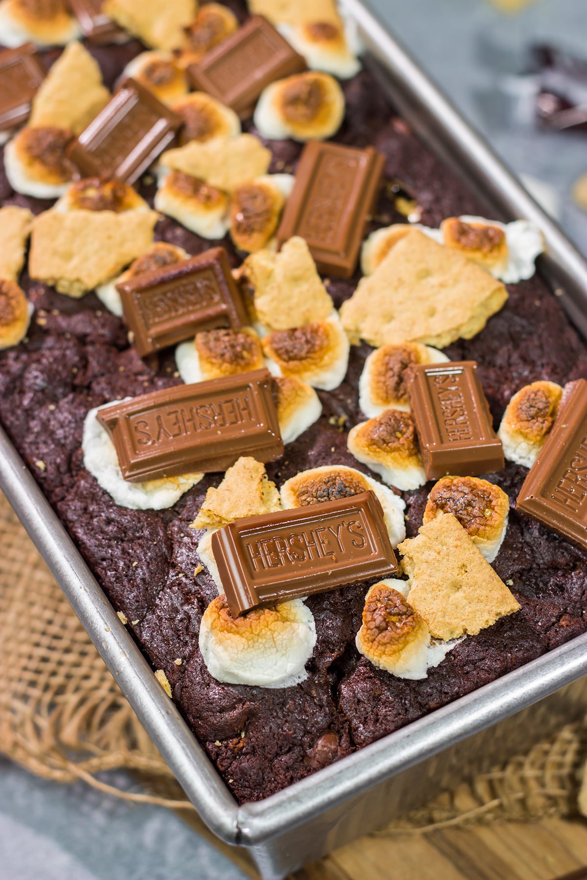 Loaded with chocolate, graham crackers and marshmallows, a slice of this Smores Quick Bread makes for a fantastic snack or dessert!