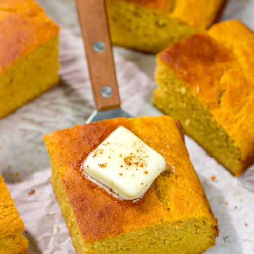 This Sweet Potato Cornbread is the perfect side dish for fall meals. It's a delicious combination of sweet and savory, and it goes well next to barbecue or a hearty bowl of chili!