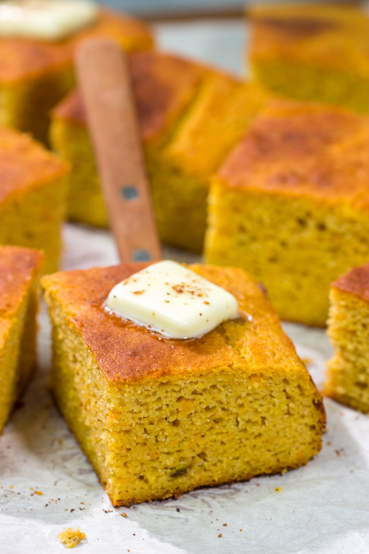 This Sweet Potato Cornbread is the perfect side dish for fall meals. It's a delicious combination of sweet and savory, and it goes well next to barbecue or a hearty bowl of chili!
