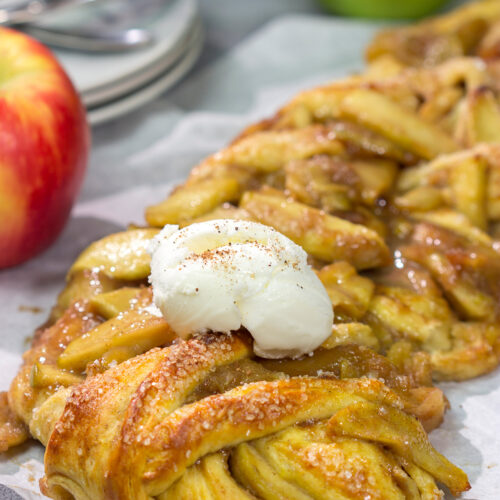 Put a twist (literally!) on a classic with this Braided Apple Pie. Apples seasoned with cinnamon and brown sugar wrapped in buttery pie dough - it's the perfect fall dessert!