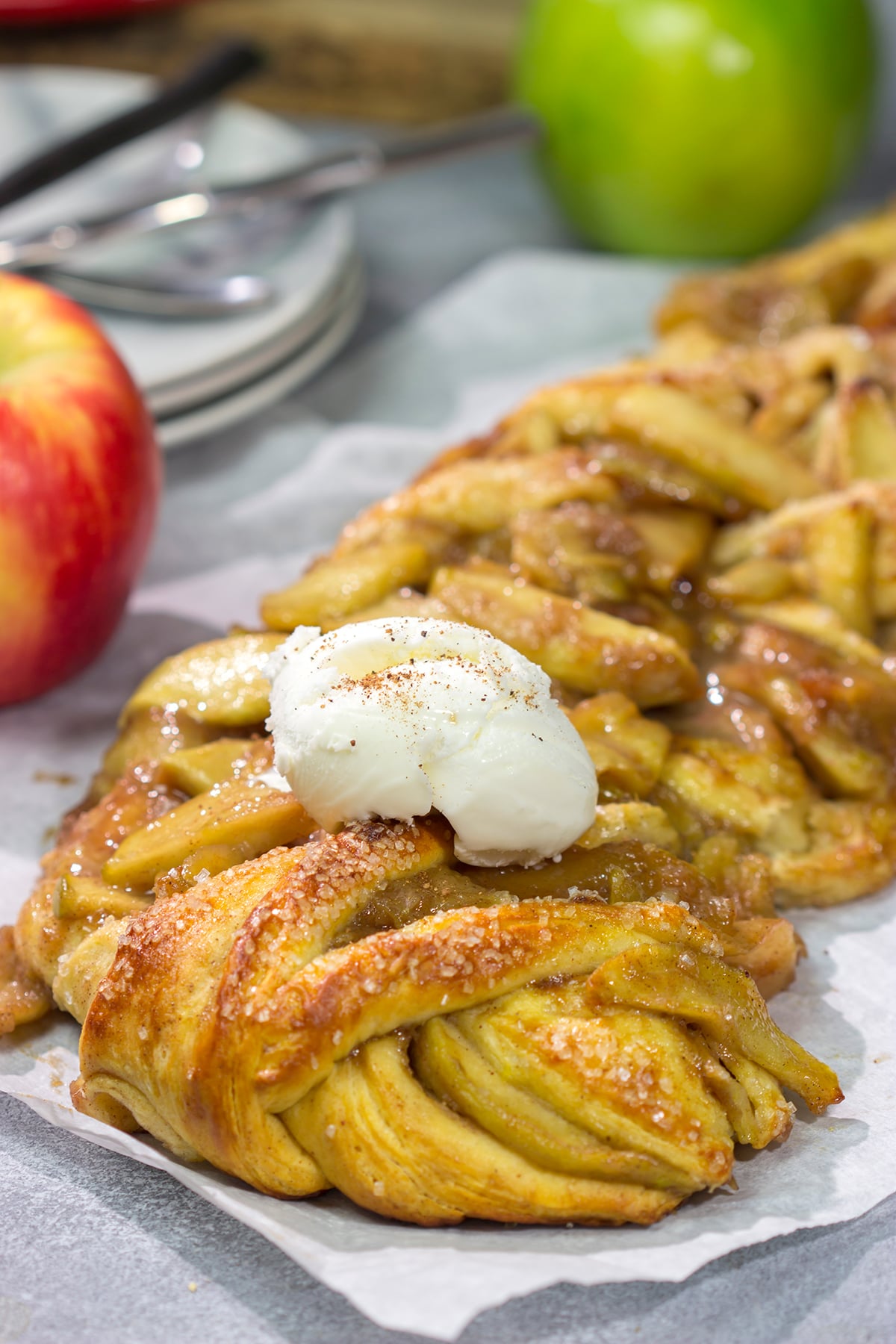 Put a twist (literally!) on a classic with this Braided Apple Pie. Apples seasoned with cinnamon and brown sugar wrapped in buttery pie dough - it's the perfect fall dessert!