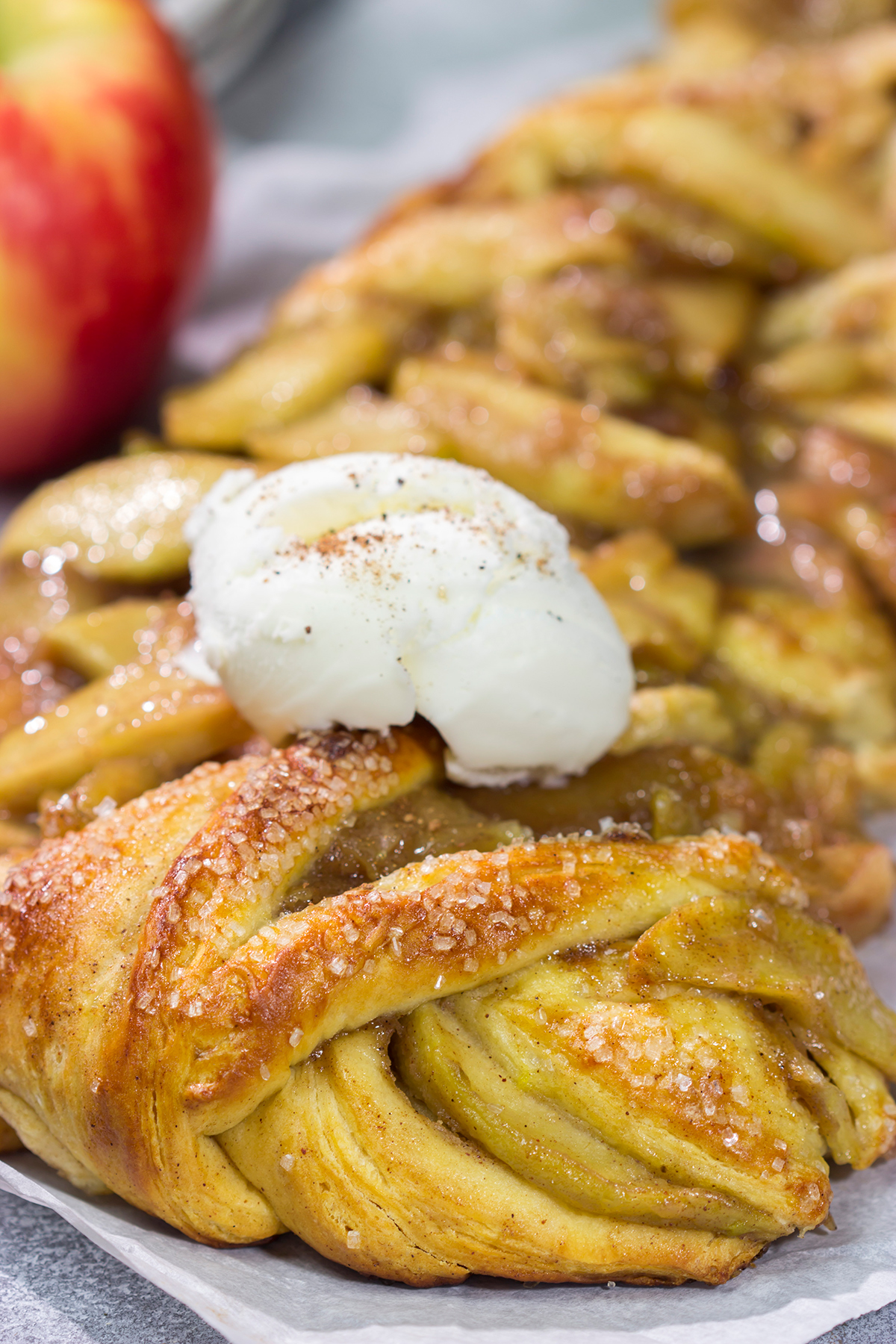 Put a twist (literally!) on a classic with this Braided Apple Pie. Apples seasoned with cinnamon and brown sugar wrapped in buttery pie dough - it's the perfect fall dessert!