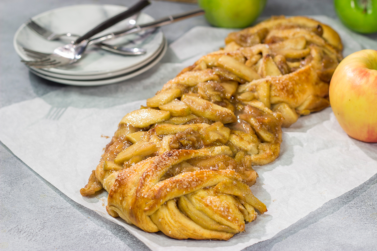 Put a twist (literally!) on a classic with this Braided Apple Pie. Apples seasoned with cinnamon and brown sugar wrapped in buttery pie dough - it's the perfect fall dessert!
