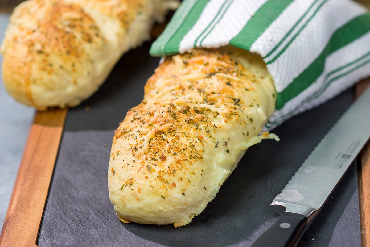 Say goodbye to boring sandwich bread! This Copycat Subway Italian Herb & Cheese Bread is soft, tender and packed with flavor. Bake up some loaves today!