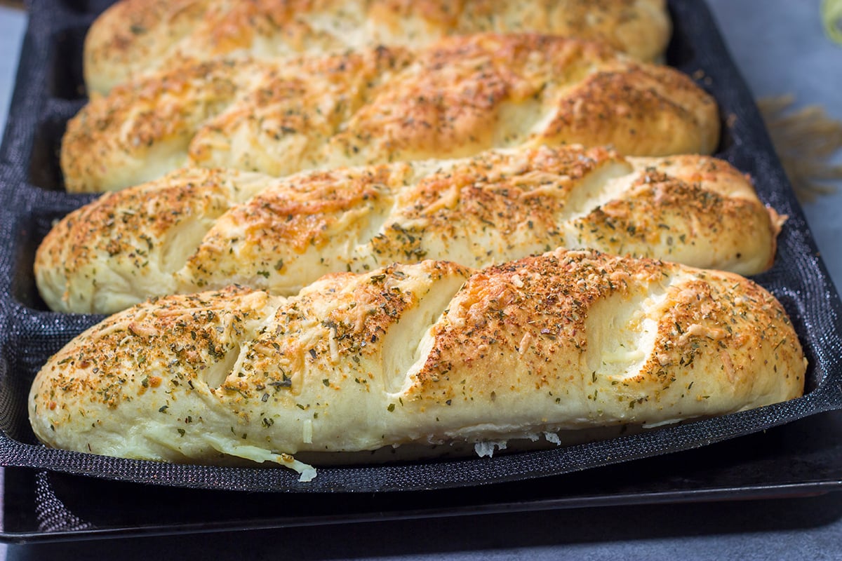 Say goodbye to boring sandwich bread! This Copycat Subway Italian Herb & Cheese Bread is soft, tender and packed with flavor. Bake up some loaves today!