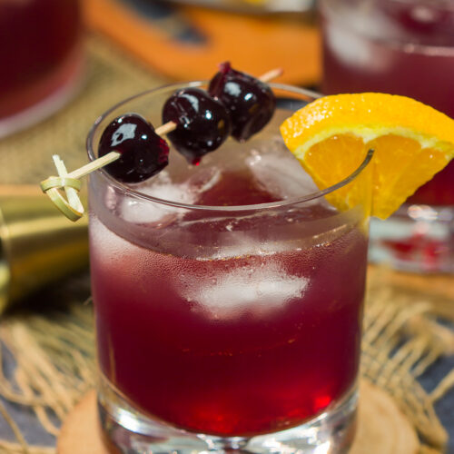 Get into the holiday spirit with a batch of this Bourbon Punch! This whiskey cocktail is easy to make, and it's sure to be the hit of the party.