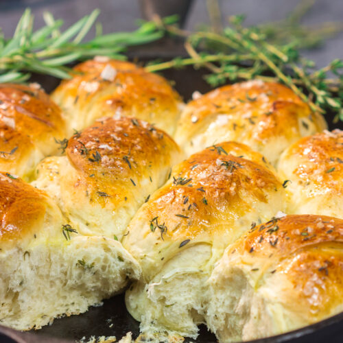 These Herbed Dinner Rolls are soft and tender, and they're packed with fresh herb flavor. Make a batch for dinner tonight!