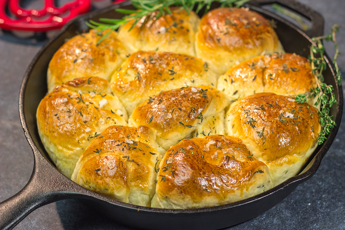 These Herbed Dinner Rolls are soft and tender, and they're packed with fresh herb flavor. Make a batch for dinner tonight!