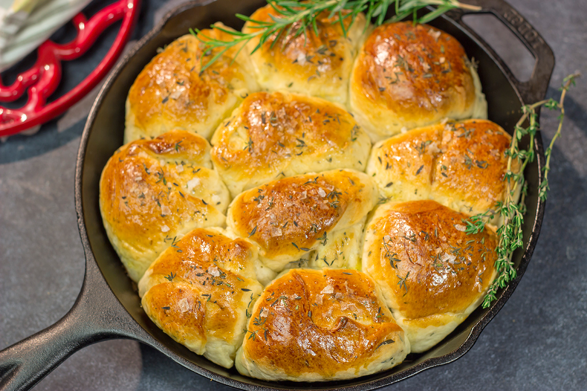 These Herbed Dinner Rolls are soft and tender, and they're packed with fresh herb flavor. Make a batch for dinner tonight!
