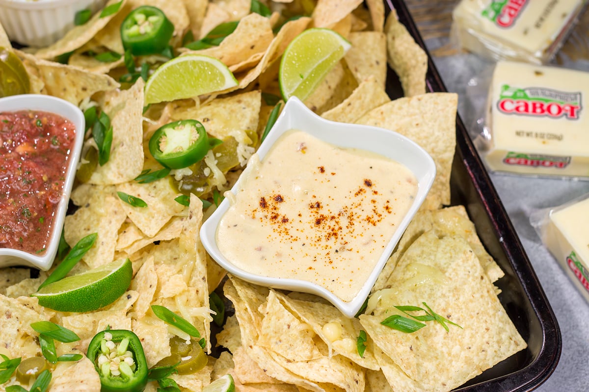 Put a tasty spin on nachos with a batch of this homemade Pepper Jack Nacho Cheese Sauce! This recipe is great for a football appetizer or a game night with friends.
