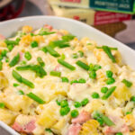 This Cheesy Ham and Potato Casserole makes for a great weeknight meal or potluck dish. The smoked ham, potatoes and cheesy cream sauce combine to create delicious cold-weather comfort food!