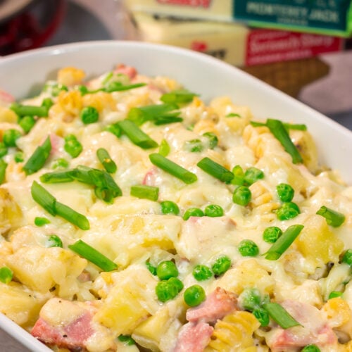 This Cheesy Ham and Potato Casserole makes for a great weeknight meal or potluck dish. The smoked ham, potatoes and cheesy cream sauce combine to create delicious cold-weather comfort food!