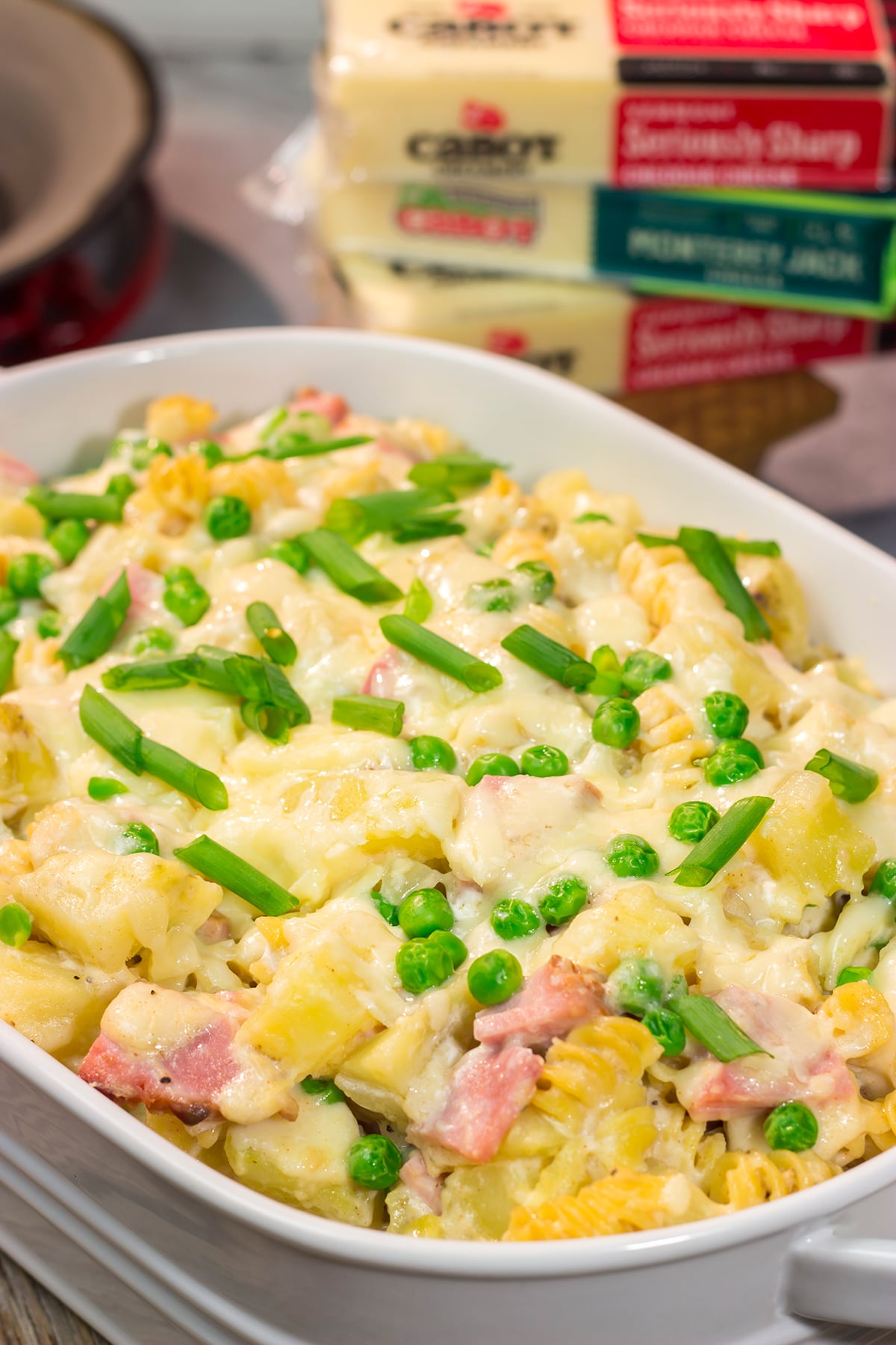 This Cheesy Ham and Potato Casserole makes for a great weeknight meal or potluck dish. The smoked ham, potatoes and cheesy cream sauce combine to create delicious cold-weather comfort food!