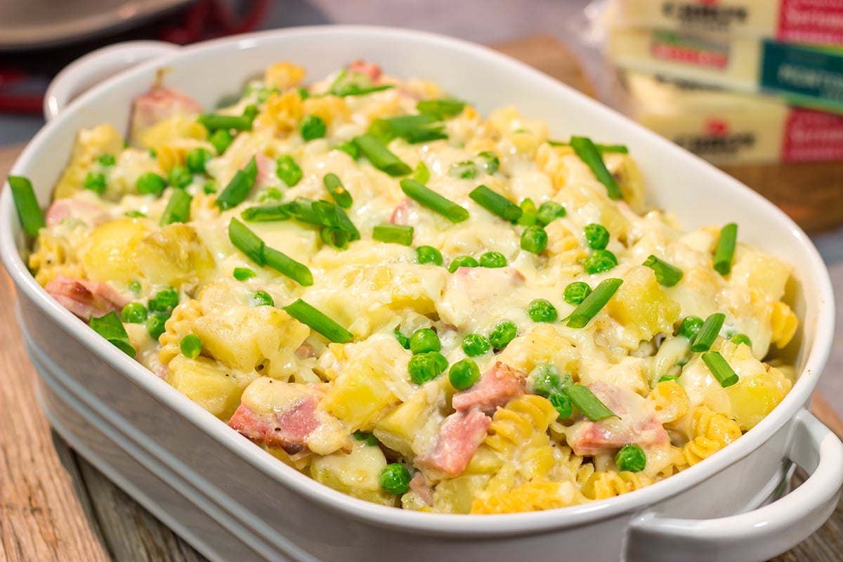 This Cheesy Ham and Potato Casserole makes for a great weeknight meal or potluck dish. The smoked ham, potatoes and cheesy cream sauce combine to create delicious cold-weather comfort food!