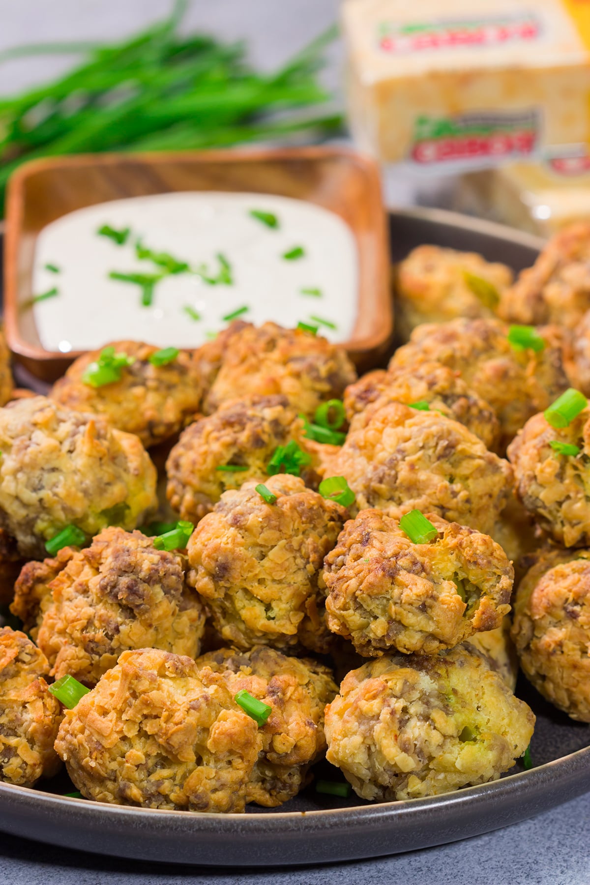 These Cheesy Sausage Balls are perfect for holiday appetizer parties and get-togethers with friends. They're easy to make...and even easier to eat!