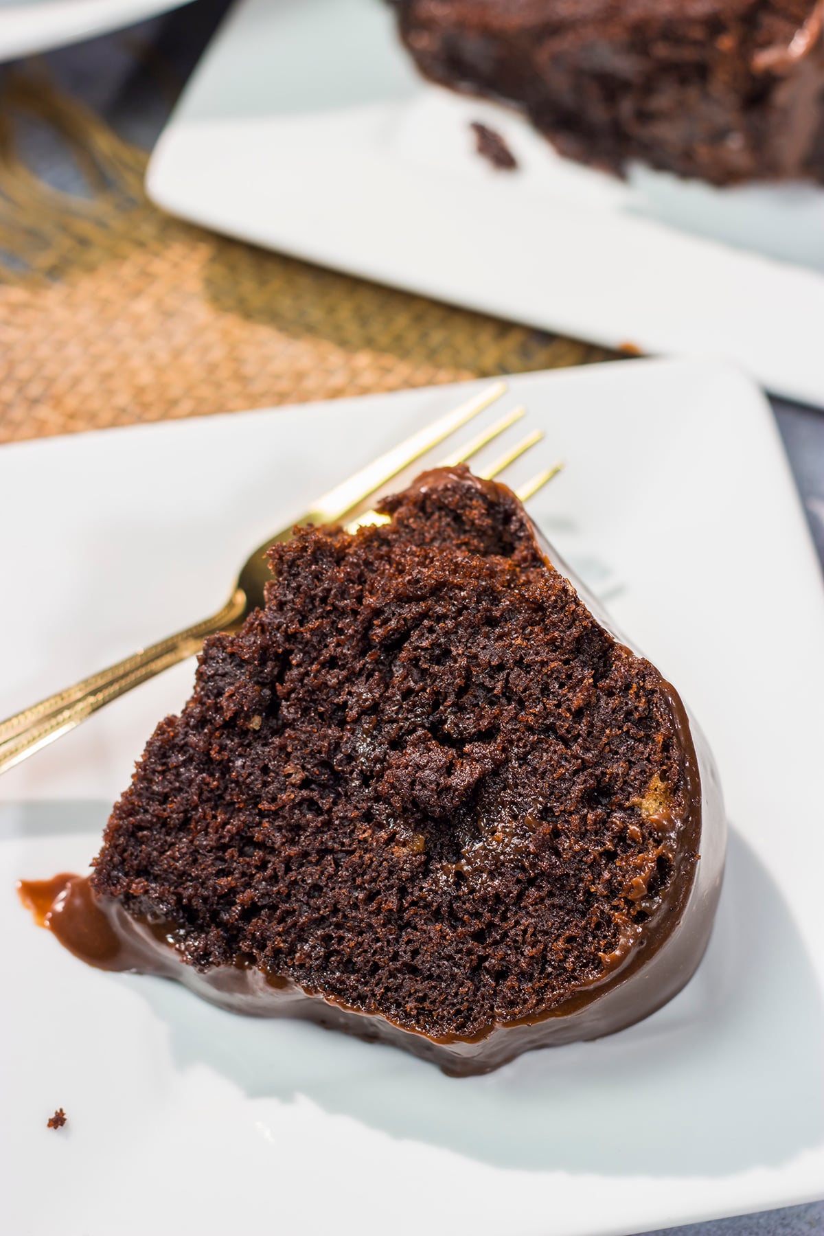 This Chocolate Mocha Cake features a moist chocolate cake topped with a pourable frosting. The chocolate and coffee flavors come together to create an amazing dessert!