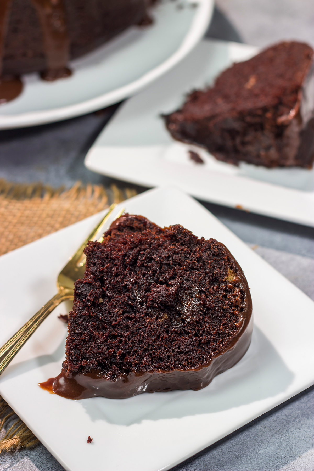 This Chocolate Mocha Cake features a moist chocolate cake topped with a pourable frosting. The chocolate and coffee flavors come together to create an amazing dessert!