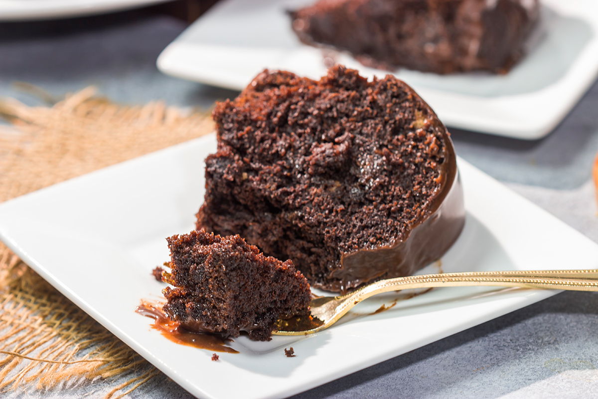 This Chocolate Mocha Cake features a moist chocolate cake topped with a pourable frosting. The chocolate and coffee flavors come together to create an amazing dessert!