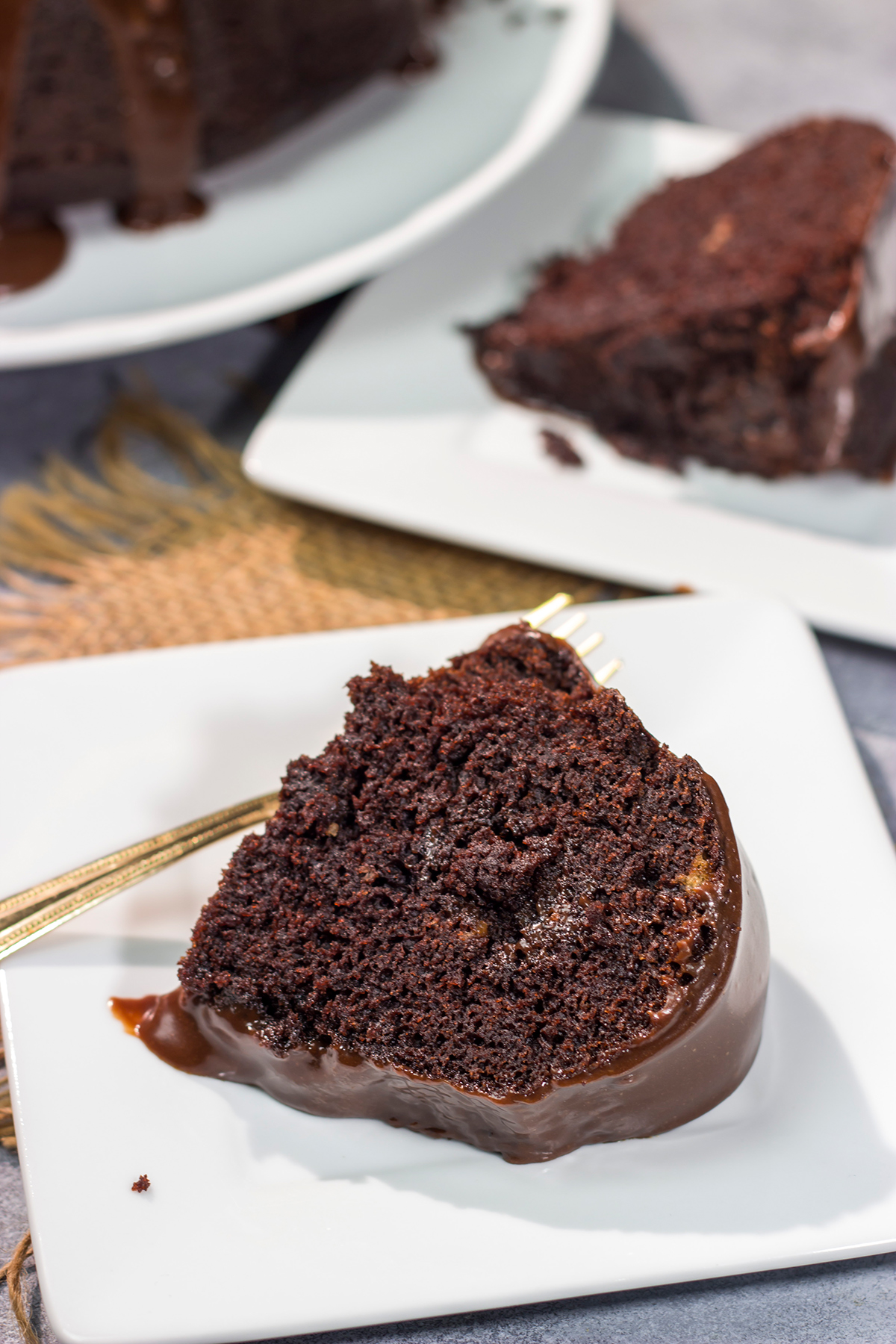 This Chocolate Mocha Cake features a moist chocolate cake topped with a pourable frosting. The chocolate and coffee flavors come together to create an amazing dessert!