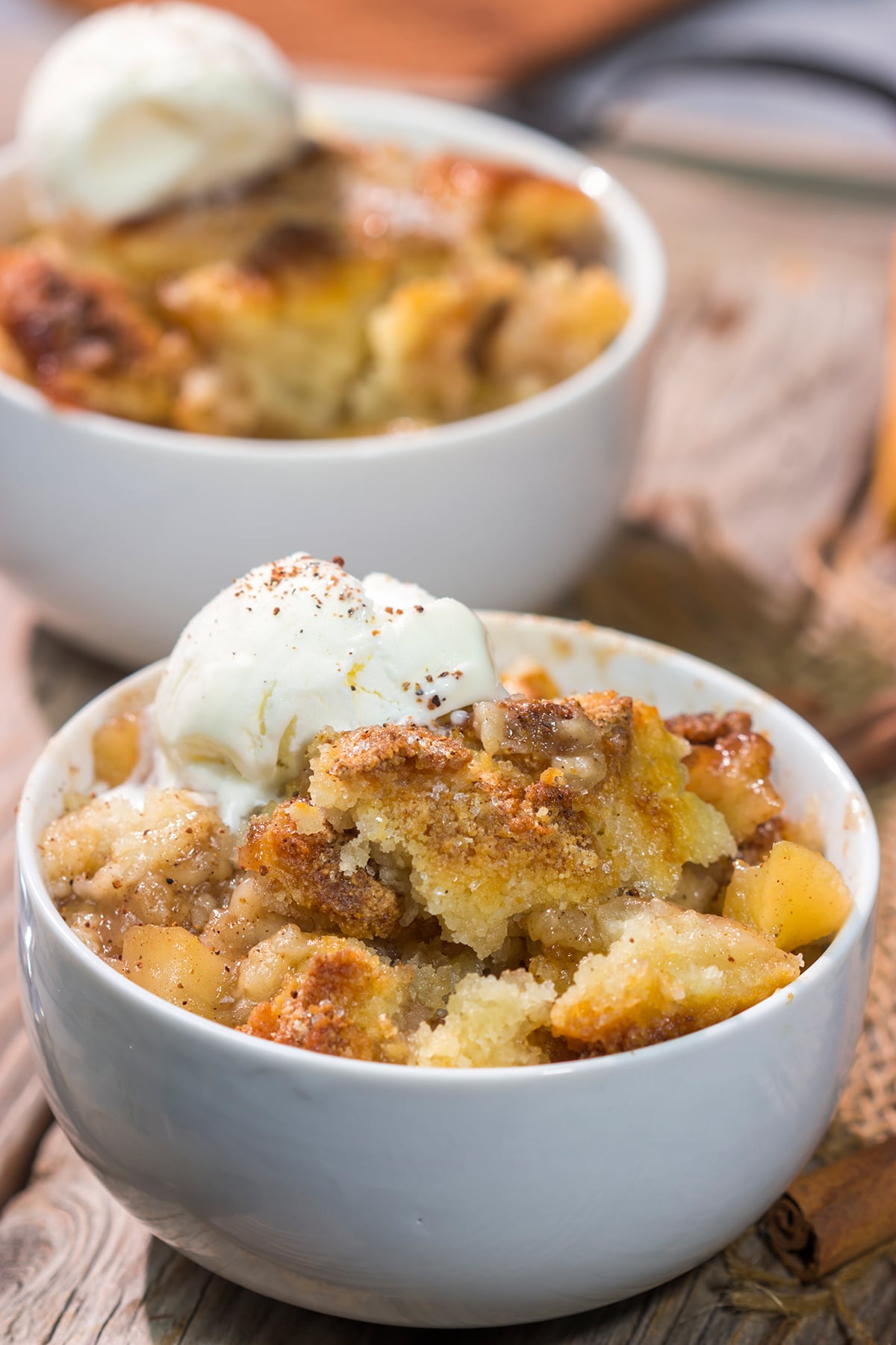 Topped with a golden brown crust and filled with spiced apples, this Cinnamon Apple Cobbler is the perfect dessert for a chilly fall evening!