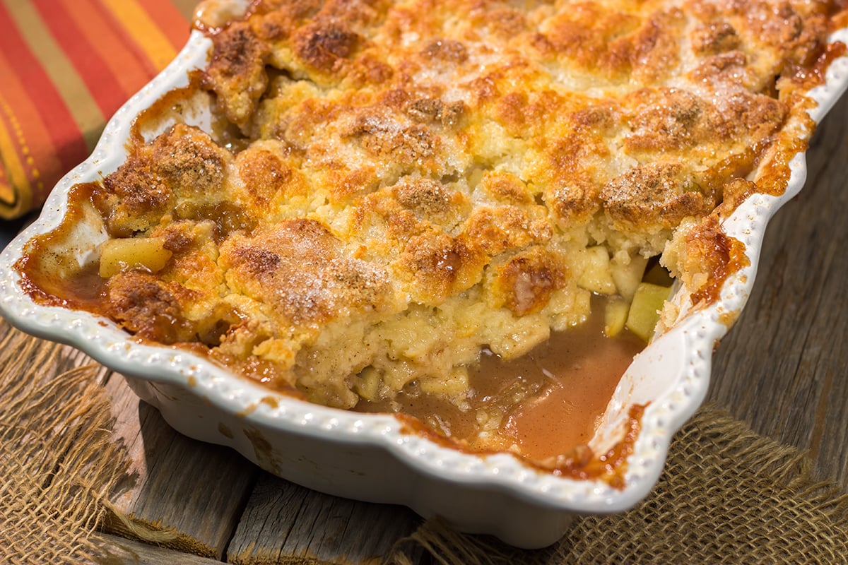 Topped with a golden brown crust and filled with spiced apples, this Cinnamon Apple Cobbler is the perfect dessert for a chilly fall evening!