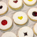 Linzer Cookies are soft, buttery cookies that are traditionally filled with various fruit jams. They are an easy but impressive cookie to make at home!
