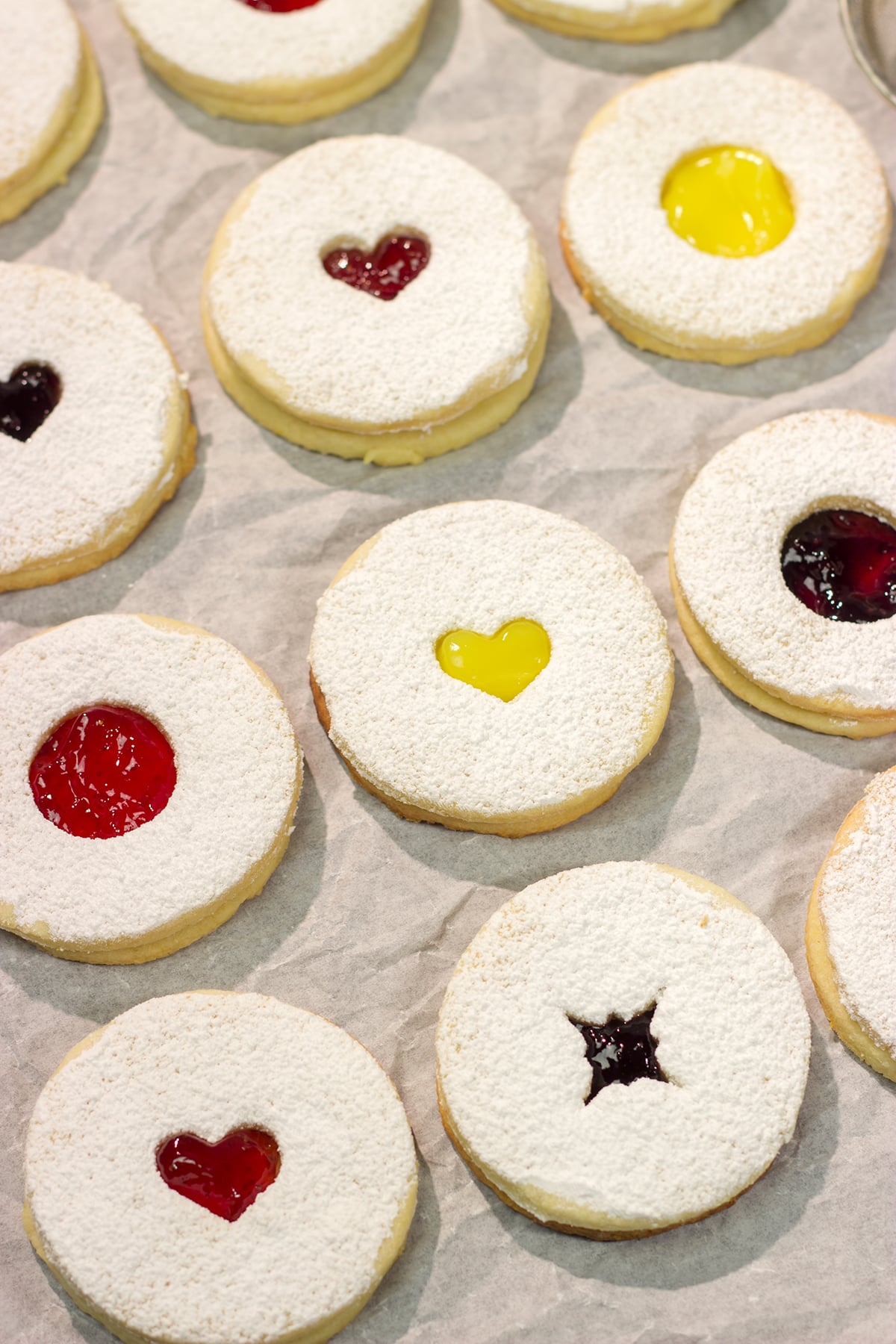 Linzer Cookies are soft, buttery cookies that are traditionally filled with various fruit jams. They are an easy but impressive cookie to make at home!