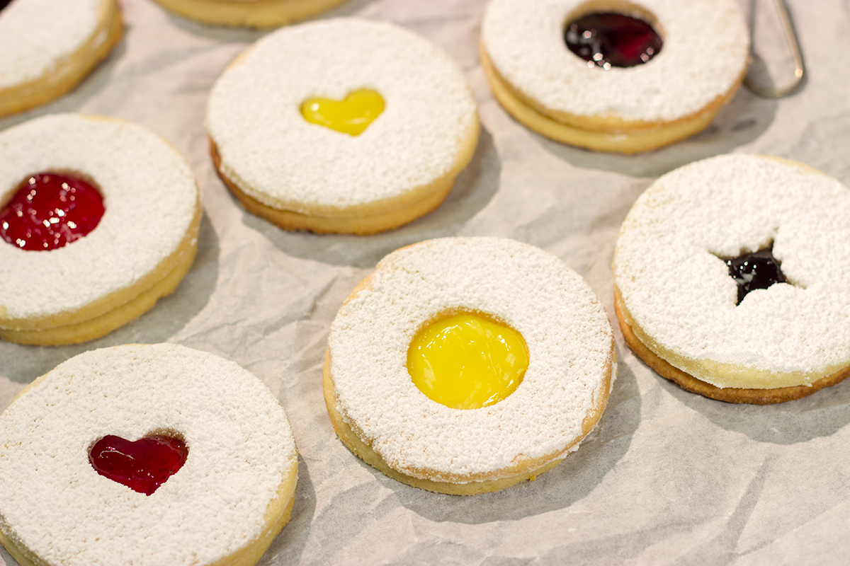 Linzer Cookies are soft, buttery cookies that are traditionally filled with various fruit jams. They are an easy but impressive cookie to make at home!