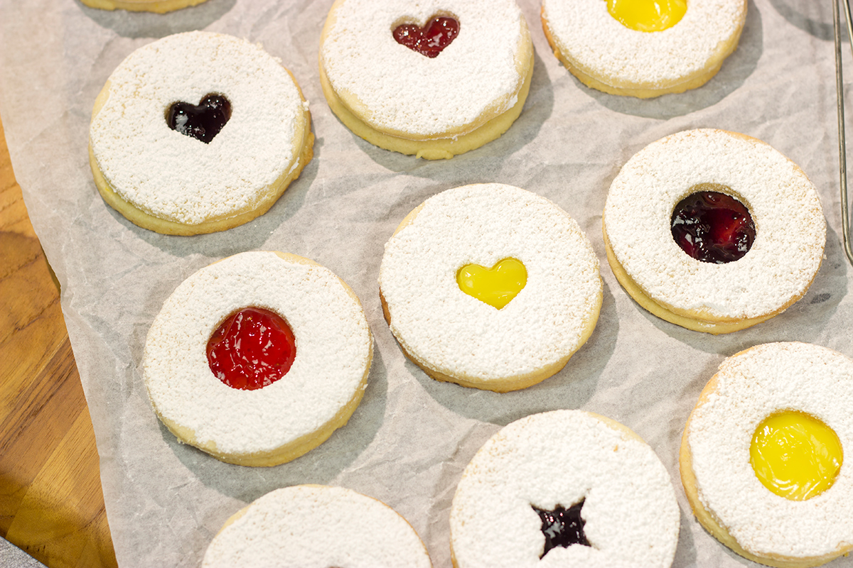 Linzer Cookies are soft, buttery cookies that are traditionally filled with various fruit jams. They are an easy but impressive cookie to make at home!