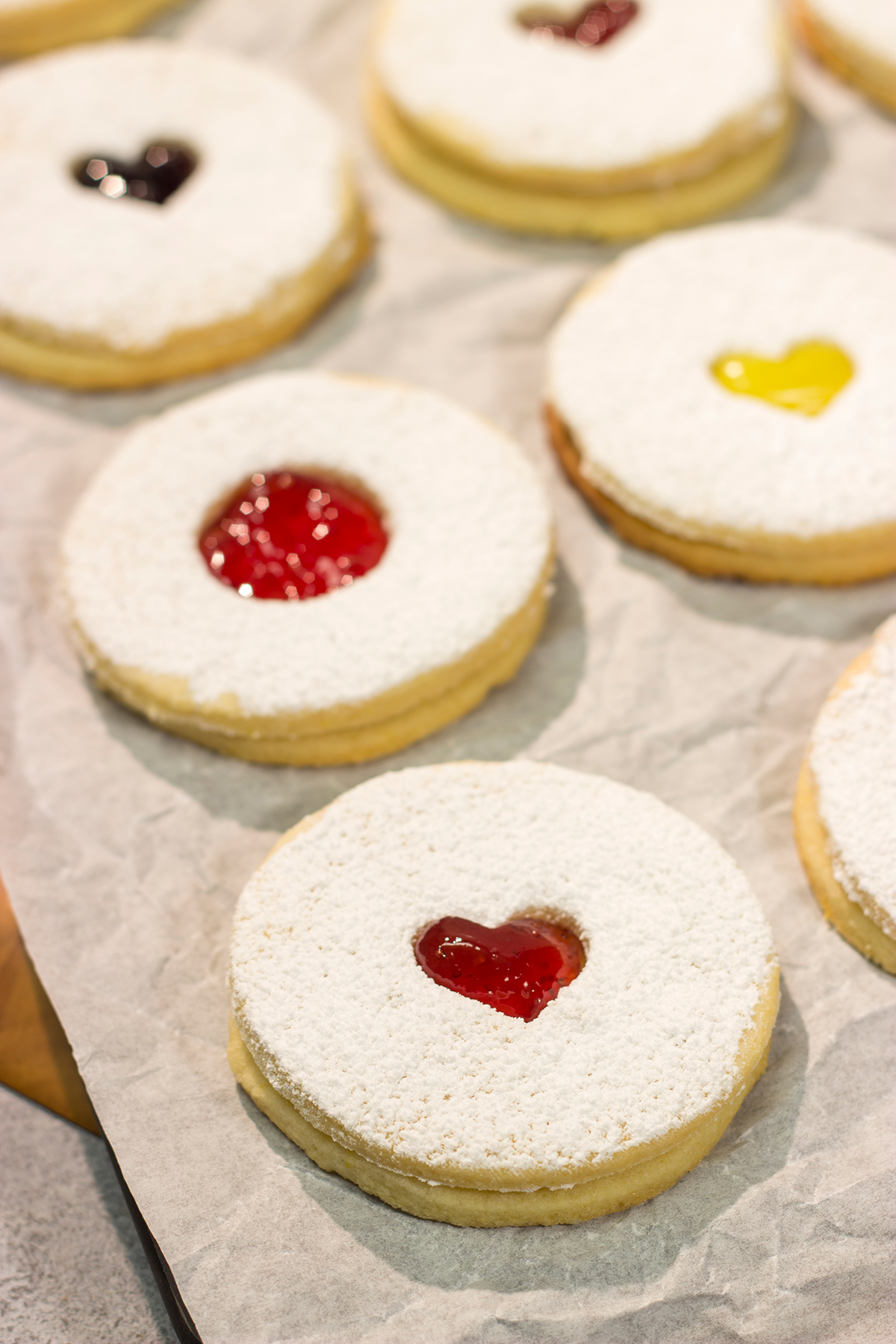 Linzer Cookies are soft, buttery cookies that are traditionally filled with various fruit jams. They are an easy but impressive cookie to make at home!