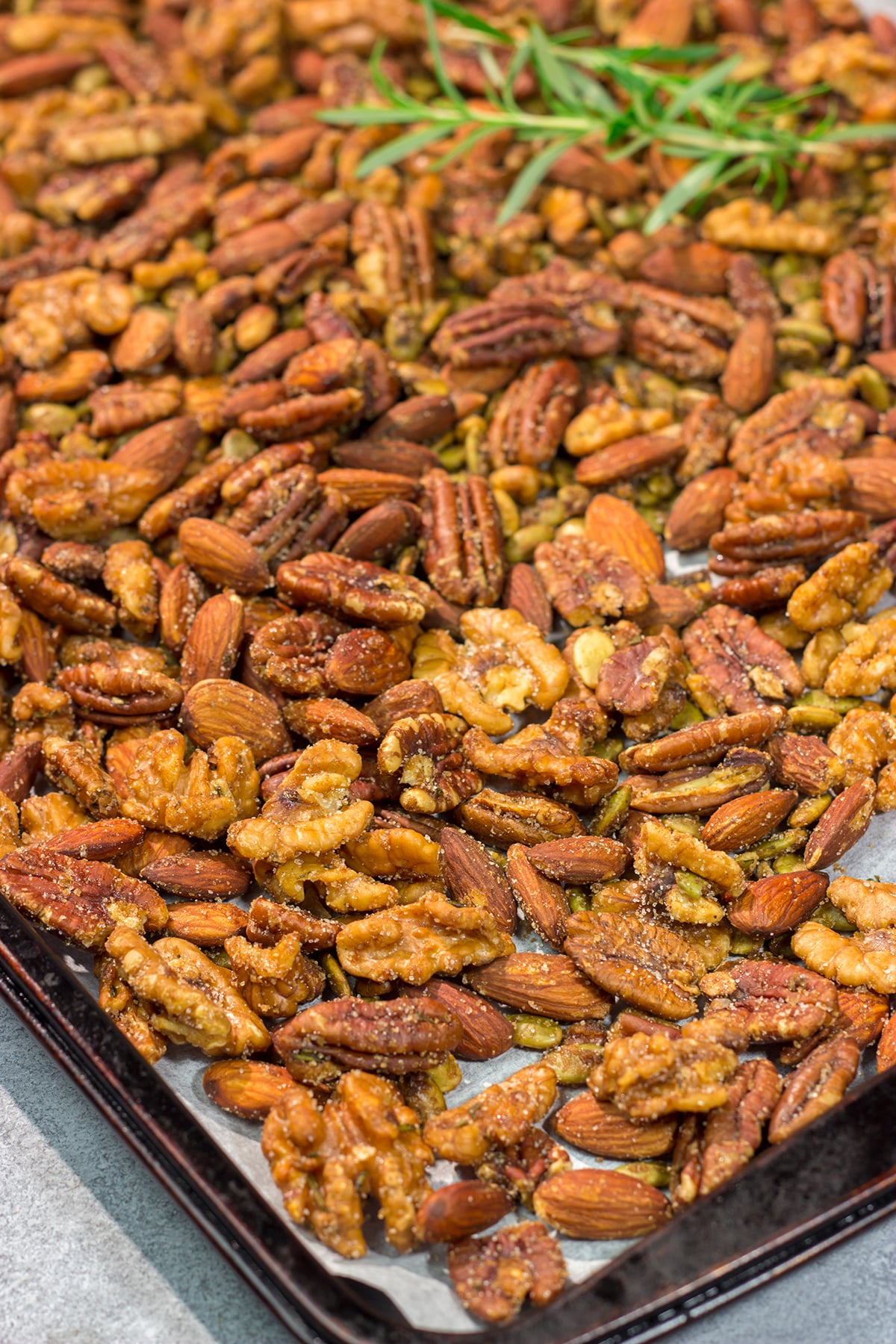These Maple Roasted Nuts are great for snacking or as an addition to holiday appetizer parties. The sweet and salty combination makes these nuts absolutely delicious!