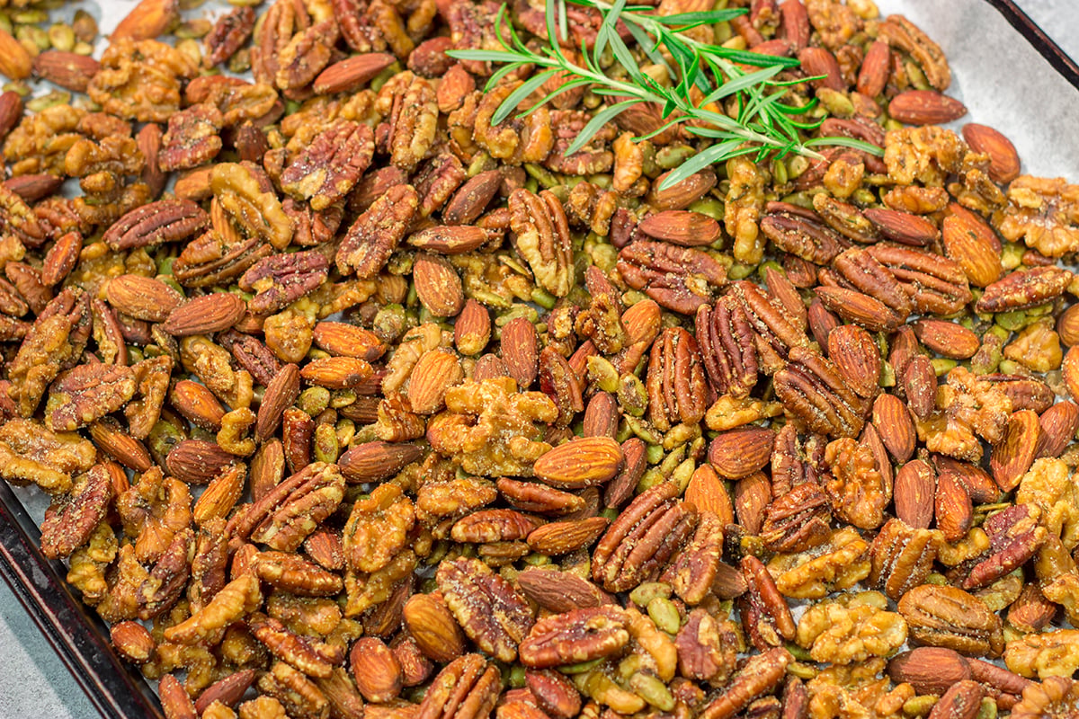 These Maple Roasted Nuts are great for snacking or as an addition to holiday appetizer parties. The sweet and salty combination makes these nuts absolutely delicious!