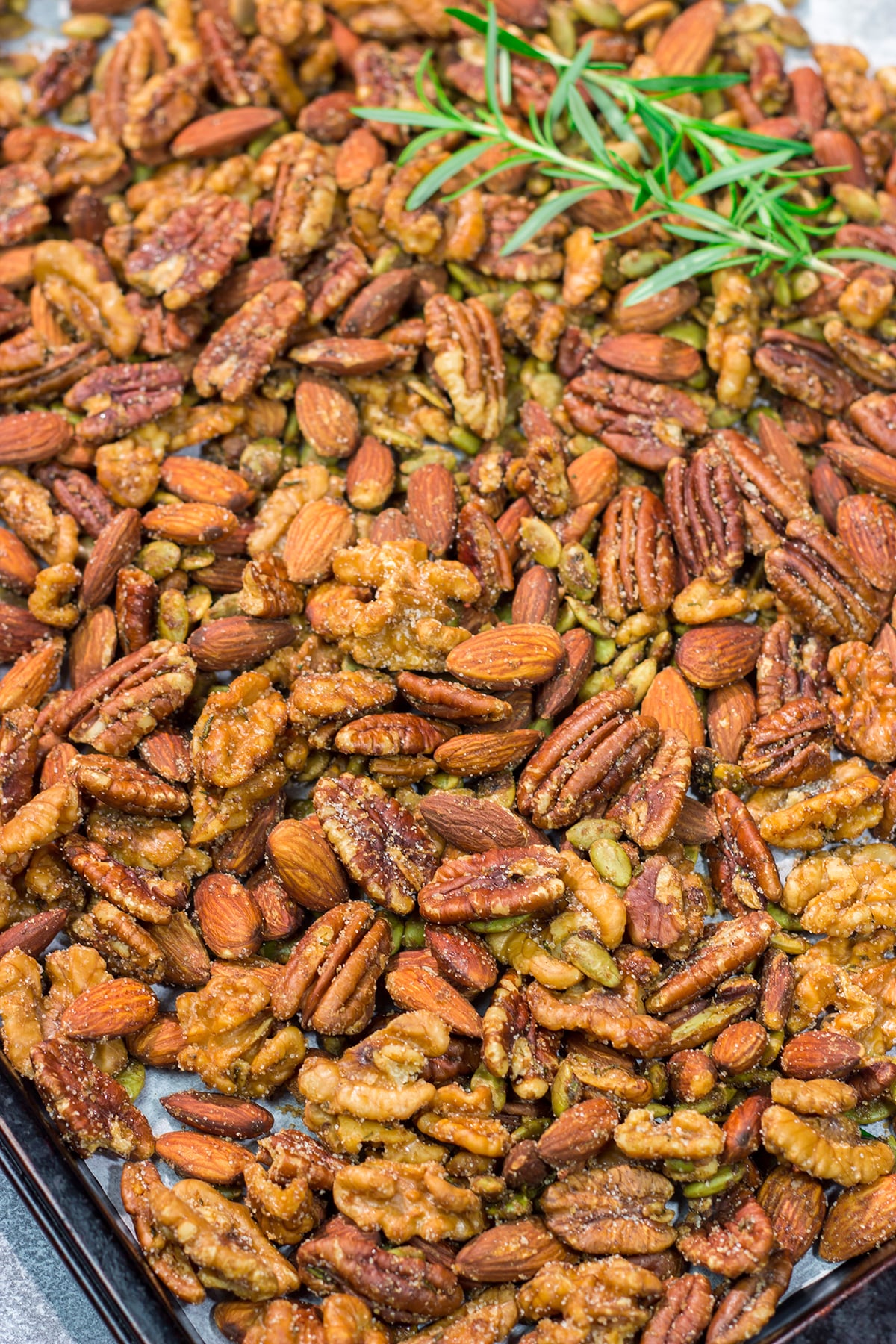 These Maple Roasted Nuts are great for snacking or as an addition to holiday appetizer parties. The sweet and salty combination makes these nuts absolutely delicious!