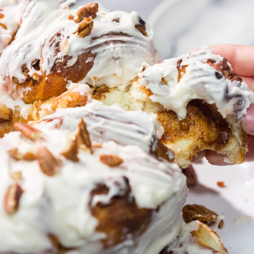 This Pull Apart Cinnamon Rolls recipe features all of your favorite cinnamon roll flavors...in a fun pull-apart version. It's great for overnight visitors or the holiday season!