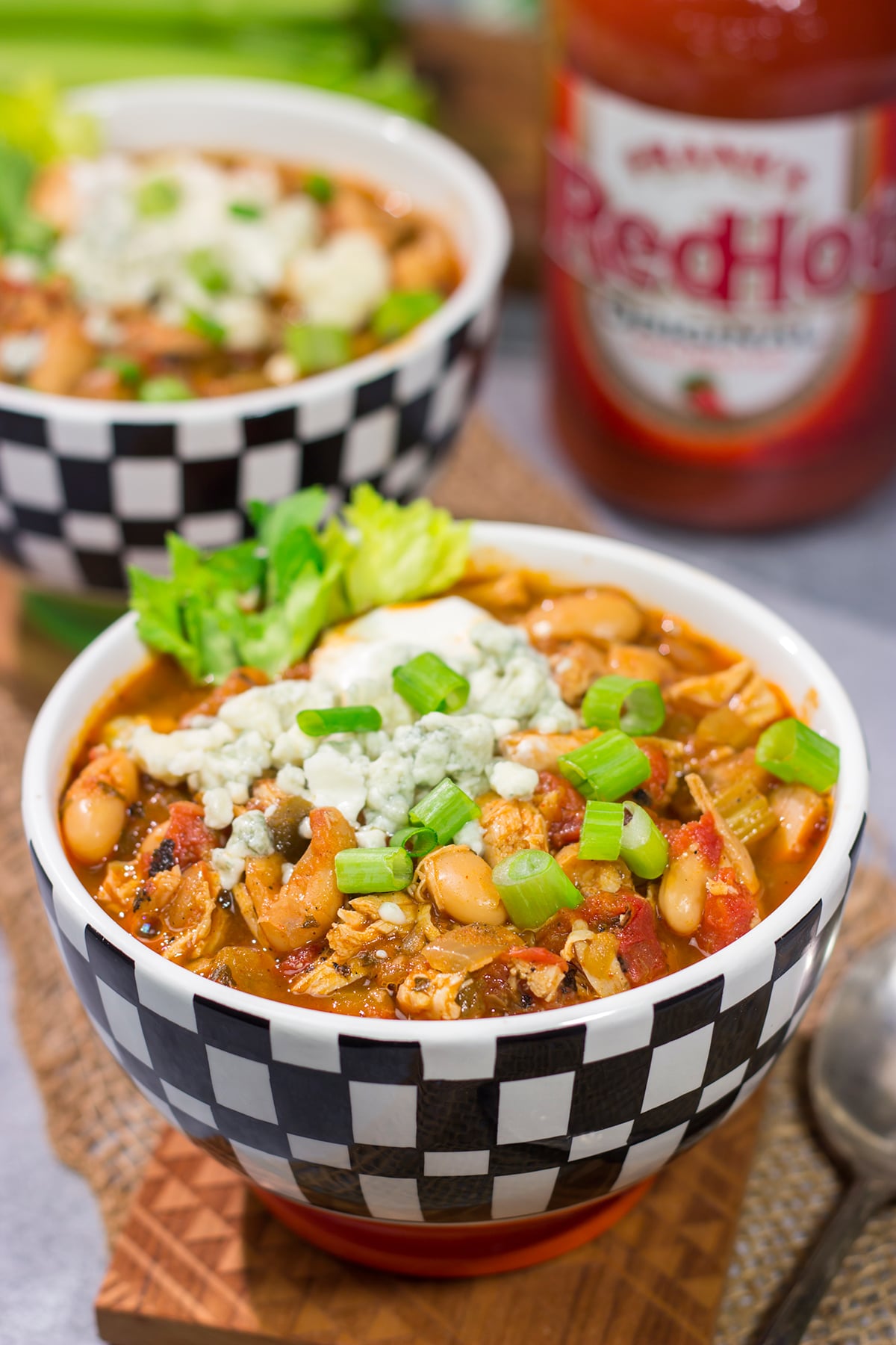 Combine two gameday favorites into one with this Buffalo Chicken Chili. This easy recipe is creamy, spicy...and absolutely delicious!