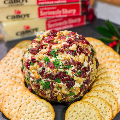 This Cranberry Walnut Cheese Ball is an easy and festive holiday appetizer. That leaves you more time to get back to being the holiday cheermeister!