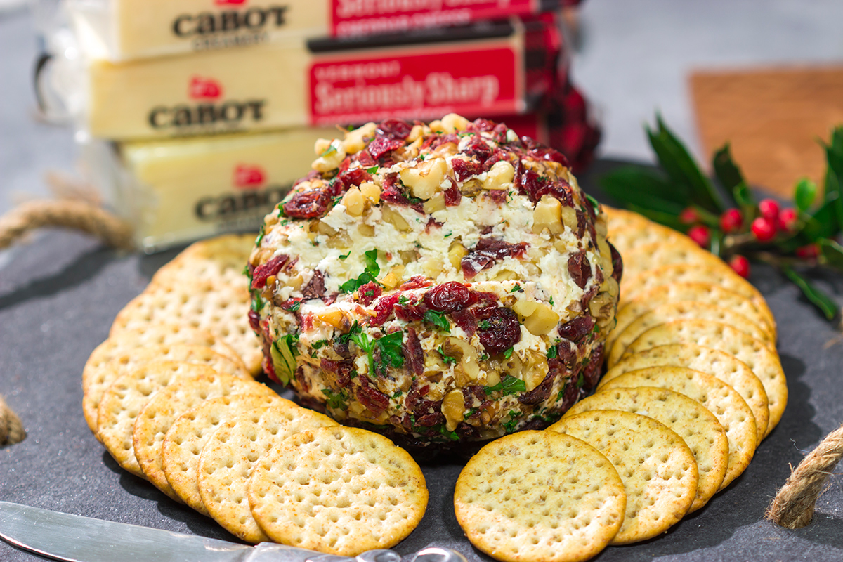 This Cranberry Walnut Cheese Ball is an easy and festive holiday appetizer. That leaves you more time to get back to being the holiday cheermeister!