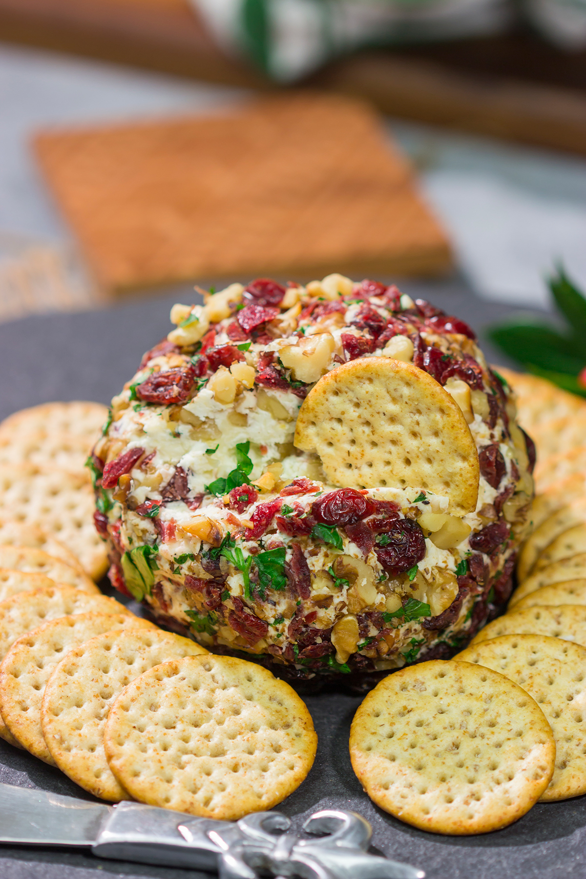 This Cranberry Walnut Cheese Ball is an easy and festive holiday appetizer. That leaves you more time to get back to being the holiday cheermeister!