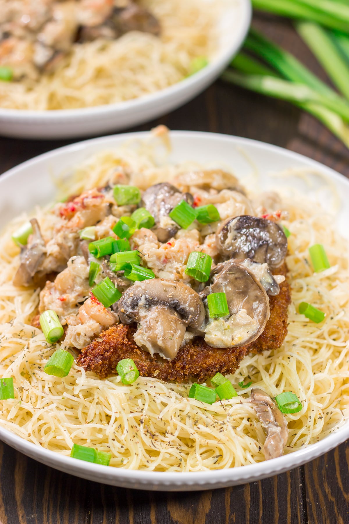Inspired by the dish from Copeland's of New Orleans, Chicken Rene features garlic butter pasta topped with fried chicken, mushrooms, crab and crawfish. It's delicious!