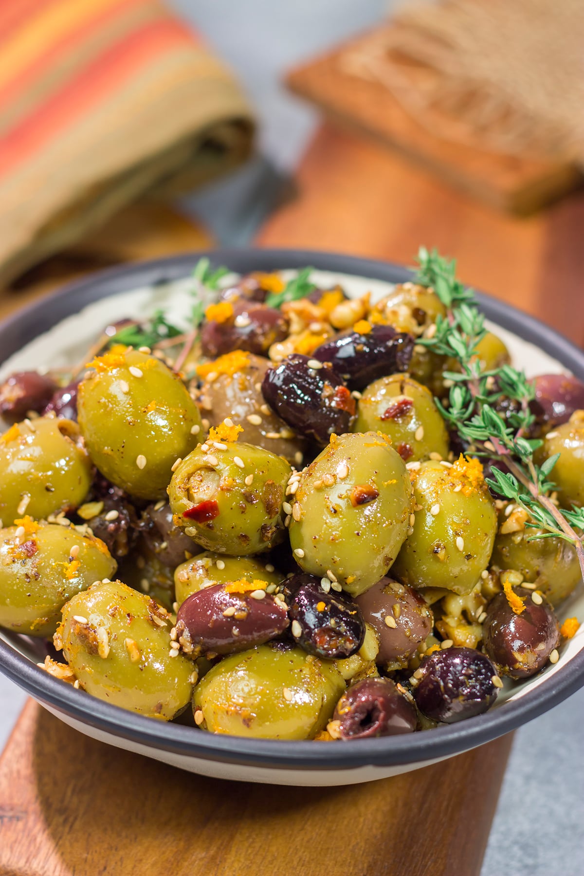 Featuring orange zest, walnuts and za'atar seasoning, these Citrus Olives with Za'atar make for a unique and delicious appetizer!