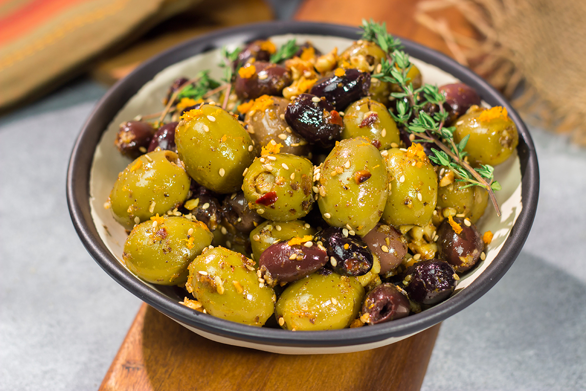 Featuring orange zest, walnuts and za'atar seasoning, these Citrus Olives with Za'atar make for a unique and delicious appetizer!