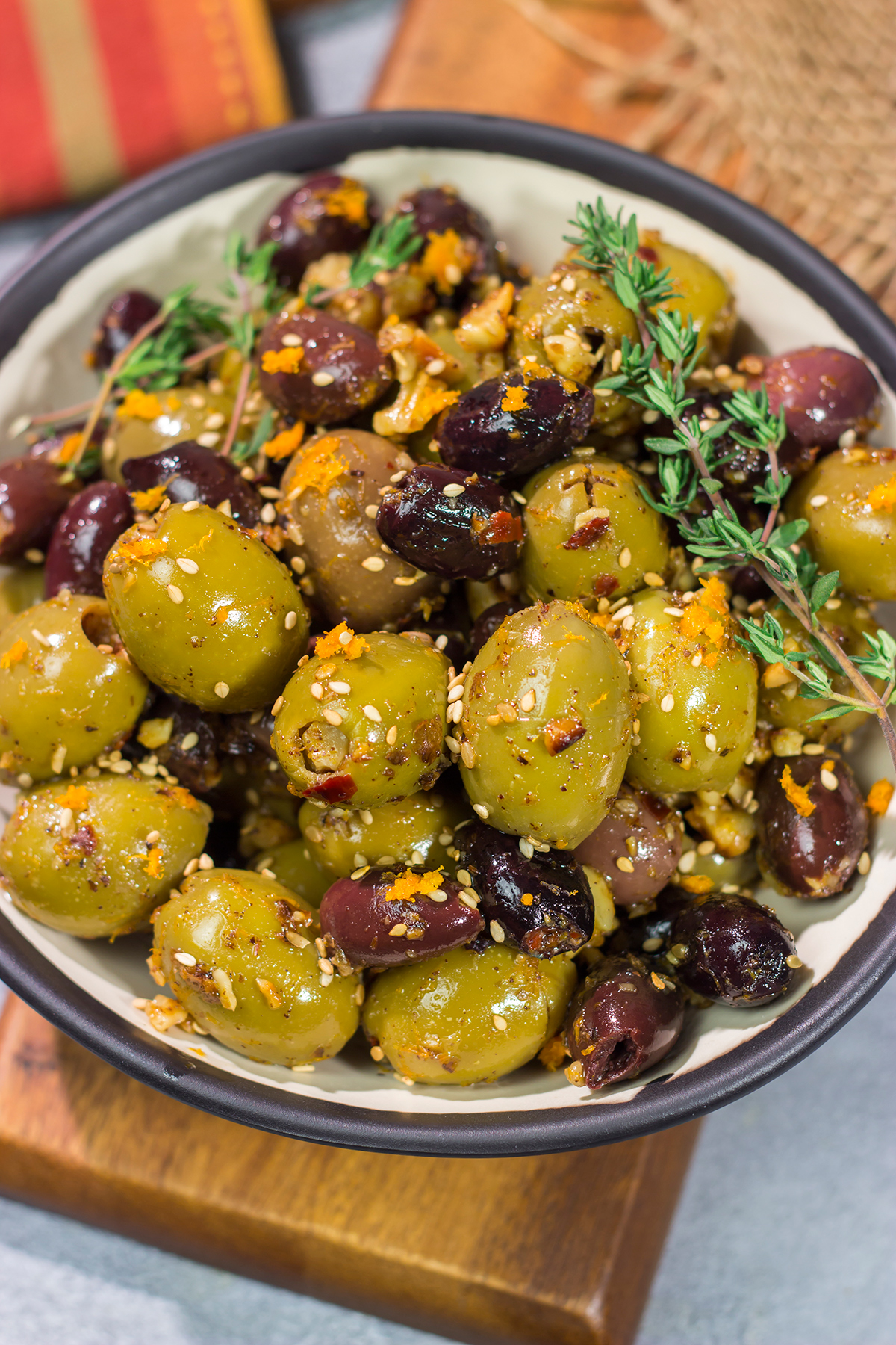 Featuring orange zest, walnuts and za'atar seasoning, these Citrus Olives with Za'atar make for a unique and delicious appetizer!