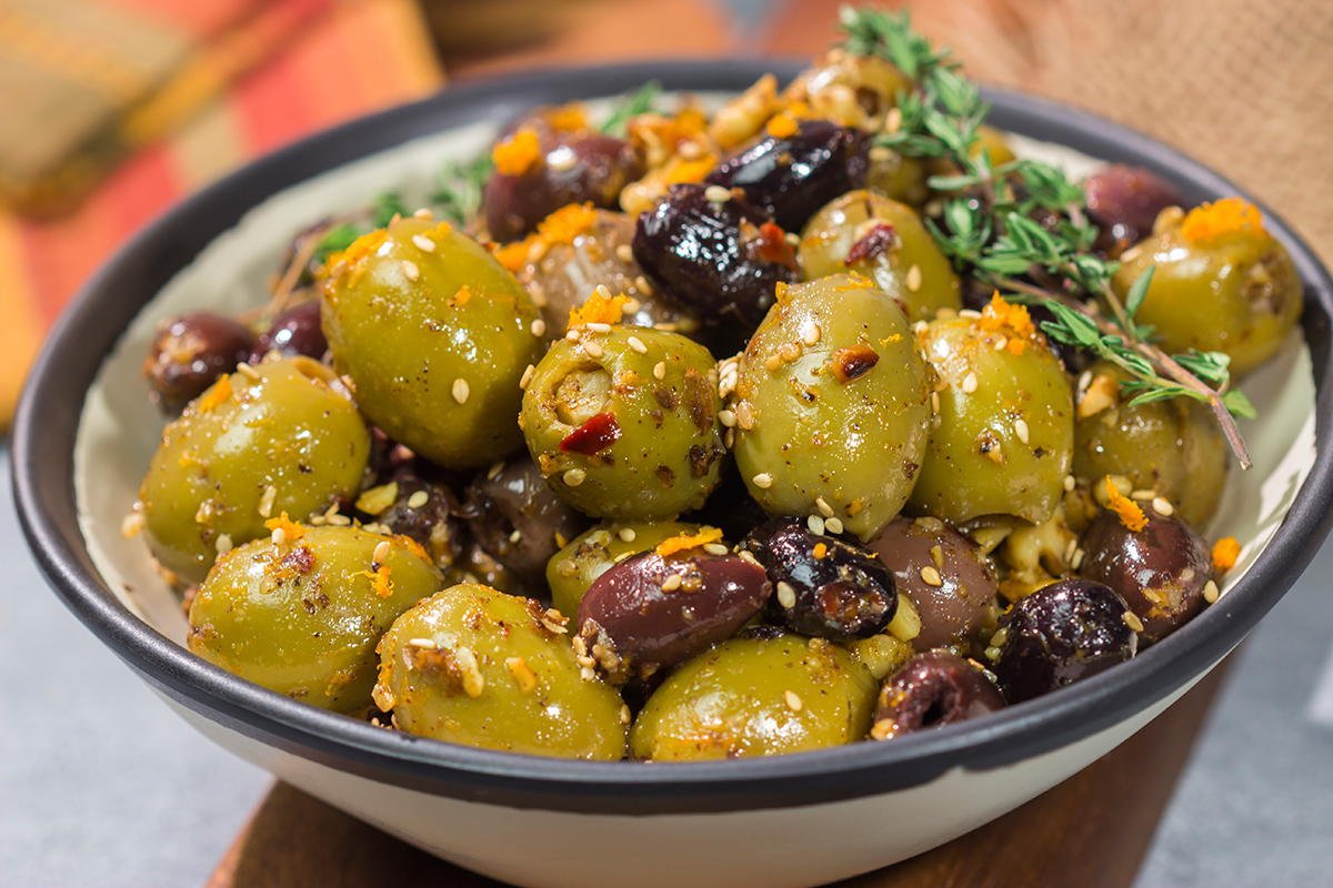 Featuring orange zest, walnuts and za'atar seasoning, these Citrus Olives with Za'atar make for a unique and delicious appetizer!