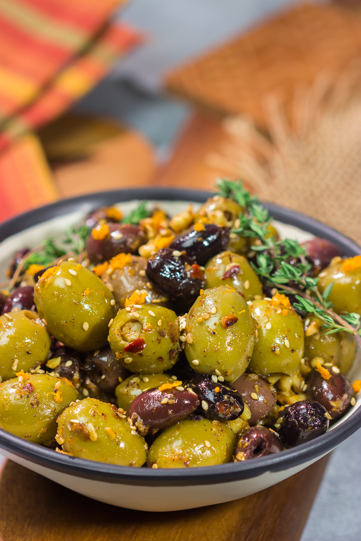 Featuring orange zest, walnuts and za'atar seasoning, these Citrus Olives with Za'atar make for a unique and delicious appetizer!