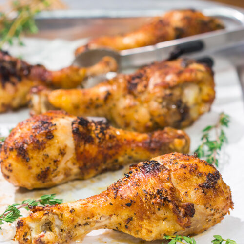 With only 10-minutes of prep time, these Crispy Baked Chicken Drumsticks make for an easy weeknight meal. They taste just like rotisserie chicken!