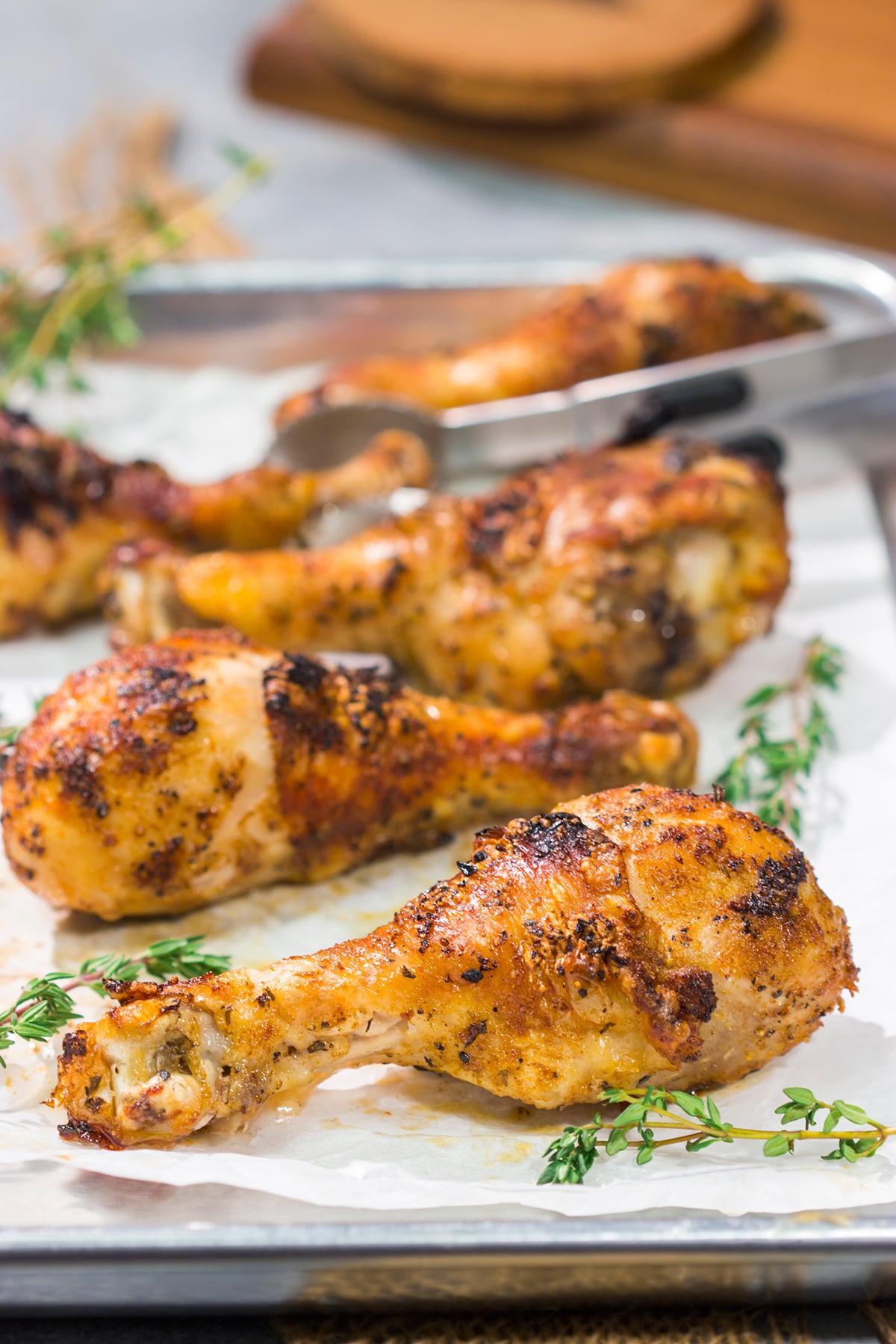 With only 10-minutes of prep time, these Crispy Baked Chicken Drumsticks make for an easy weeknight meal. They taste just like rotisserie chicken!